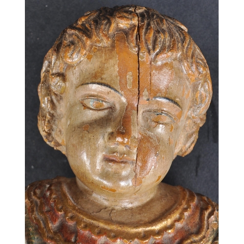 147 - An 18th century Italian wood carved child Christ.  Polychrome painted, finely carved detailing of fl... 