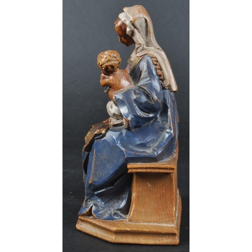 149 - An early - mid 20th Century German / Swiss alpine wood carved figurine depicting Mary the Mother / M... 