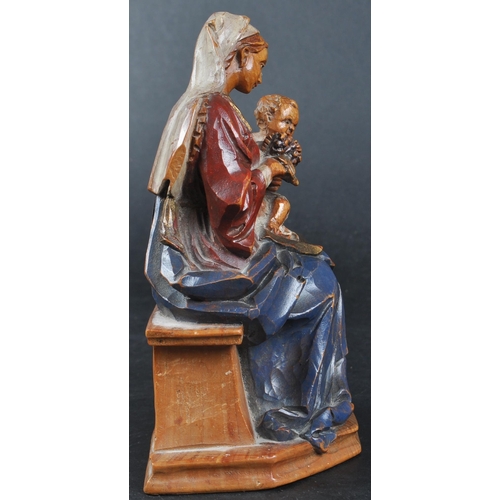 149 - An early - mid 20th Century German / Swiss alpine wood carved figurine depicting Mary the Mother / M... 