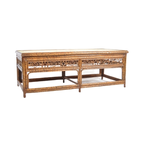 151 - An early 20th Century Chinoiserie bamboo low coffee table of rectangular form having a painted flora... 