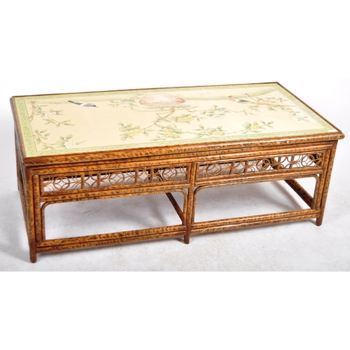 151 - An early 20th Century Chinoiserie bamboo low coffee table of rectangular form having a painted flora... 