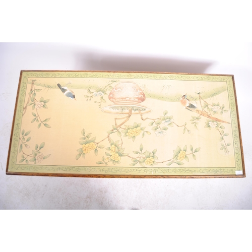 151 - An early 20th Century Chinoiserie bamboo low coffee table of rectangular form having a painted flora... 