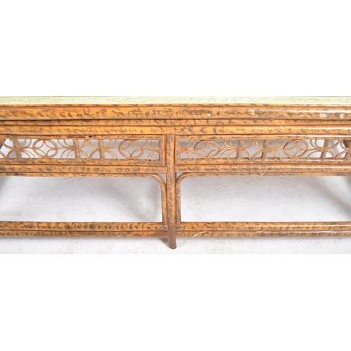 151 - An early 20th Century Chinoiserie bamboo low coffee table of rectangular form having a painted flora... 