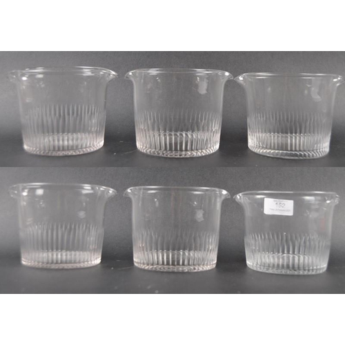 152 - A set of six early 19th Century George III cut glass double lip rinsers. Circular form with twin pou... 