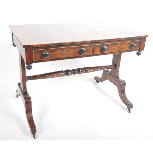 153 - An early 19th Century Regency rosewood library table / writing table desk having a line inlaid top w... 