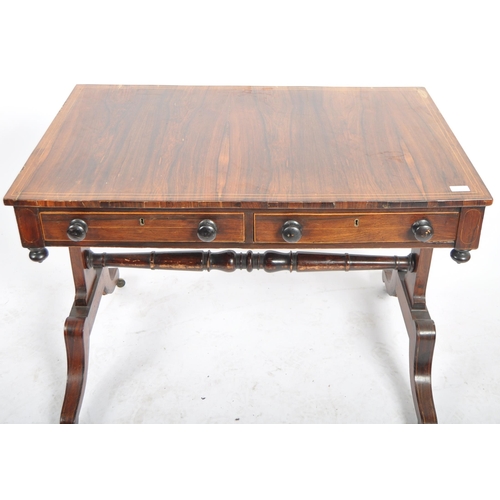 153 - An early 19th Century Regency rosewood library table / writing table desk having a line inlaid top w... 