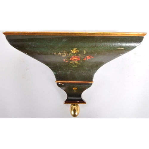 156 - A 20th Century painted bracket clock on matching wall bracket shelf. Large glazed door with gilt det... 