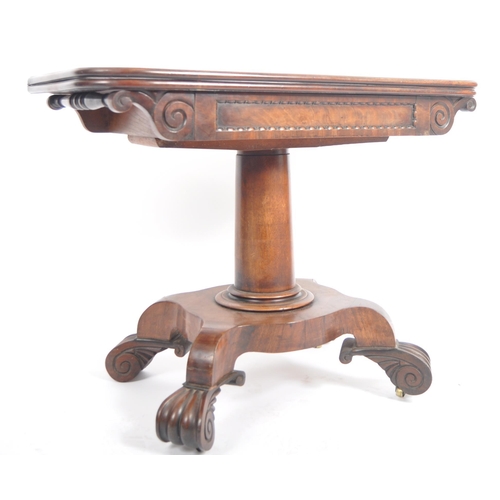 157 - A 19th Century William IV mahogany tea table. Metamorphic folding swivel action to with carved friez... 