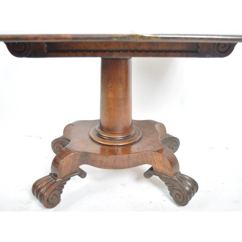 157 - A 19th Century William IV mahogany tea table. Metamorphic folding swivel action to with carved friez... 