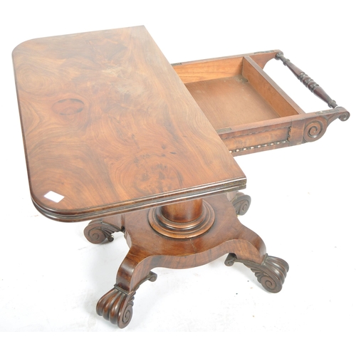 157 - A 19th Century William IV mahogany tea table. Metamorphic folding swivel action to with carved friez... 