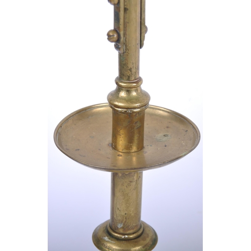 164 - A pair of 19th Century brass ecclesiastical Gothic triple sconce candlesticks / candelabra in the ma... 