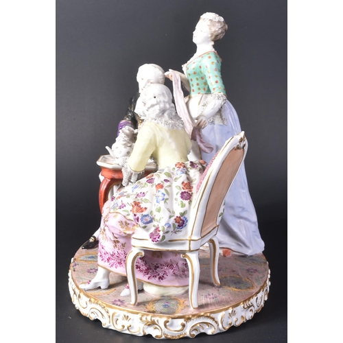 167 - A 19th Century porcelain Meissen figurine group. Depicts a group drinking tea with lady seated holdi... 