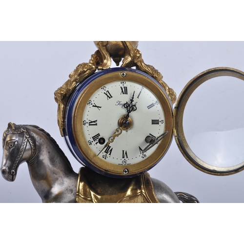 175 - A 20th century Italian gilt-metal ormolu mounted equestrian Imperial mantel clock. The cobalt blue g... 