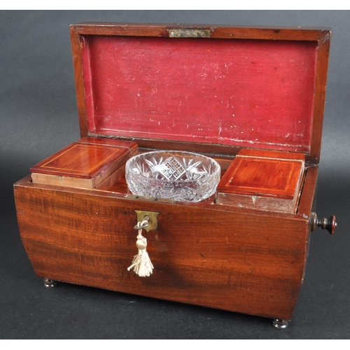 177 - A 19th Century mahogany Regency tea caddy having a sarcophagus form lid with bombe sides and twin ha... 