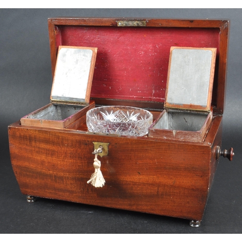 177 - A 19th Century mahogany Regency tea caddy having a sarcophagus form lid with bombe sides and twin ha... 