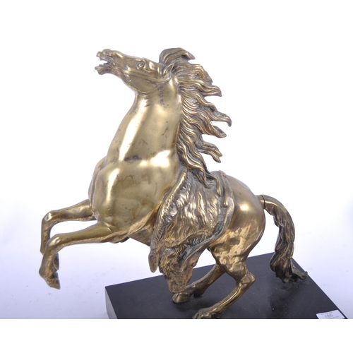 185 - A large bronze figurine depicting a Marley horse. Detailed features and modelled with front legs rai... 