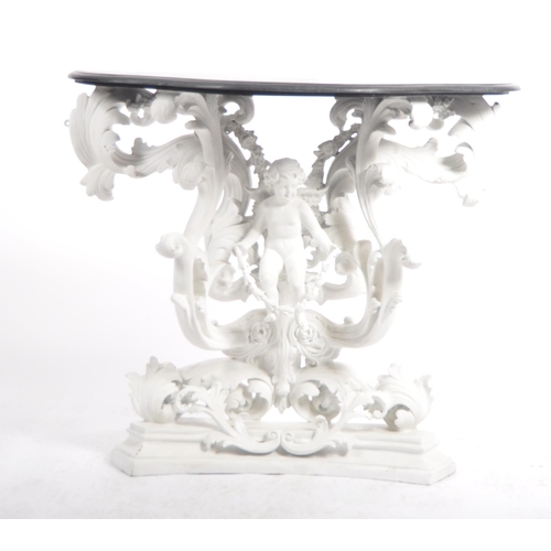 187 - A Baroque revival white painted plaster console table and matching mirror. Large angel cherub putti ... 