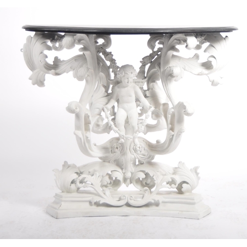 187 - A Baroque revival white painted plaster console table and matching mirror. Large angel cherub putti ... 