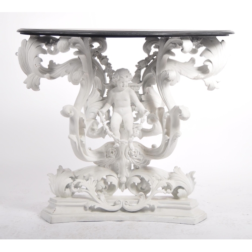 187 - A Baroque revival white painted plaster console table and matching mirror. Large angel cherub putti ... 