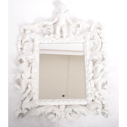 187 - A Baroque revival white painted plaster console table and matching mirror. Large angel cherub putti ... 