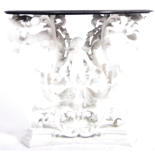 187 - A Baroque revival white painted plaster console table and matching mirror. Large angel cherub putti ... 