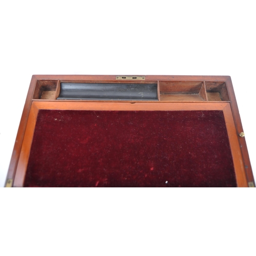 195 - A 19th Century Victorian mahogany writing slope of large size. Brass cartouche, lock and corners wit... 