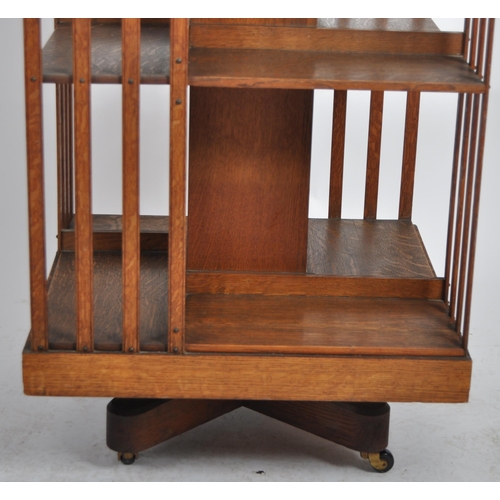 196 - An early 20th Century Edwardian oak revolving library bookcase cabinet of large size. Three tiers wi... 