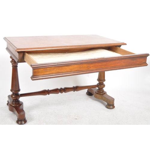 198 - A 19th Century mahogany library writing table desk. Chamfered rectangular table top raised on trestl... 