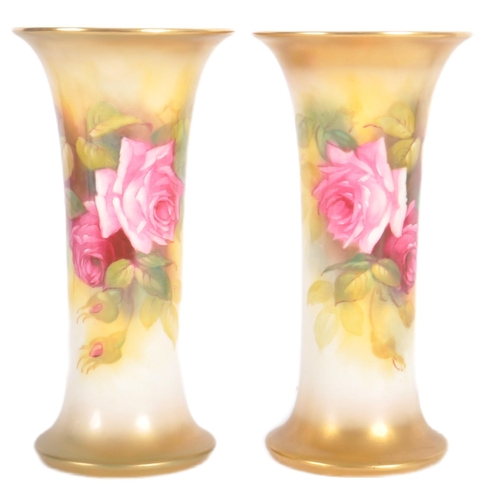 20 - A pair of Royal Worcester hand painted porcelain cabinet vases by Millie Hunt model 923. Tapered tru... 