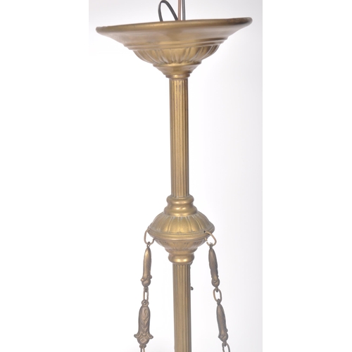 201 - A 20th Century brass hanging three branch chandelier having decorative scrolled arms with frosted gl... 