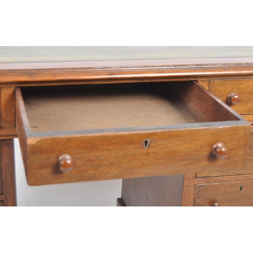 216 - A 19th Century walnut twin pedestal desk of good smaller proportions. Writing table top with sciver ... 