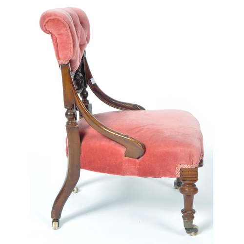 217 - A 19th Century Victorian mahogany nursing chair. The chair having a cushioned buttoned back with fre... 