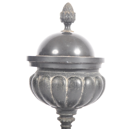 219 - A pair of 19th Century Grand Tour bronze classical lidded urns having acorn finial tops, reeded bodi... 