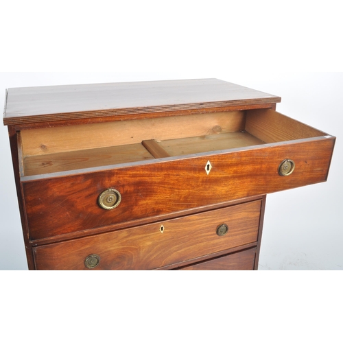 22 - An 18th Century George III mahogany bachelor's chest of drawers. The graduating bank of four drawers... 