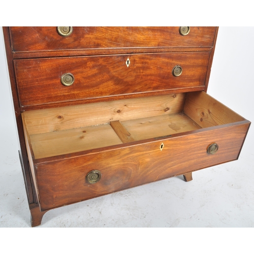 22 - An 18th Century George III mahogany bachelor's chest of drawers. The graduating bank of four drawers... 