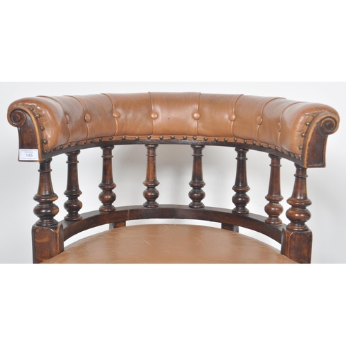 233 - An early 20th Century leather captains desk chair having a buttoned horseshoe backrest with leather ... 