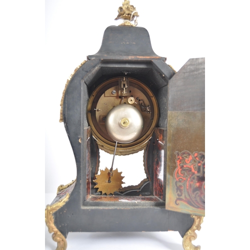 235 - A 19th Century French Boulle work mantel clock having red tortoiseshell with gilt ormolu mounts and ... 