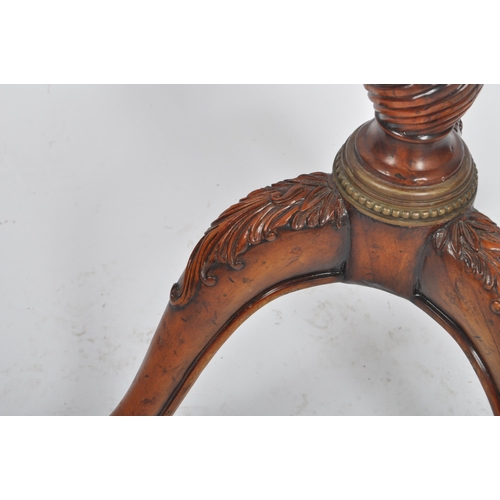 242 - 19th century George III flame mahogany tripod wine table being raised on splayed legs with turned co... 