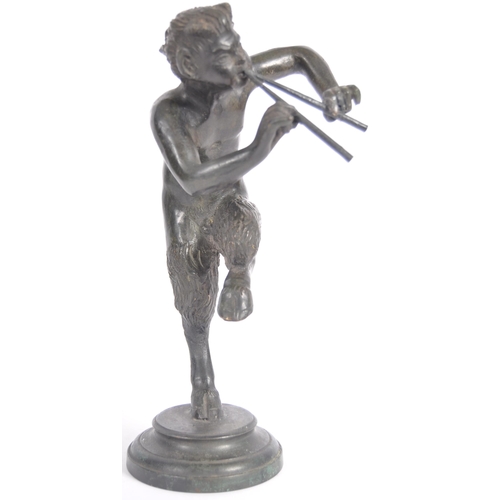 243 - A 19th Century Grand Tour bronze figurine depicting Pan. The satyr form figure having detailed featu... 