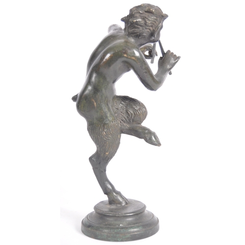 243 - A 19th Century Grand Tour bronze figurine depicting Pan. The satyr form figure having detailed featu... 