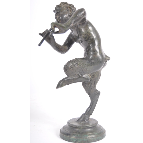 243 - A 19th Century Grand Tour bronze figurine depicting Pan. The satyr form figure having detailed featu... 