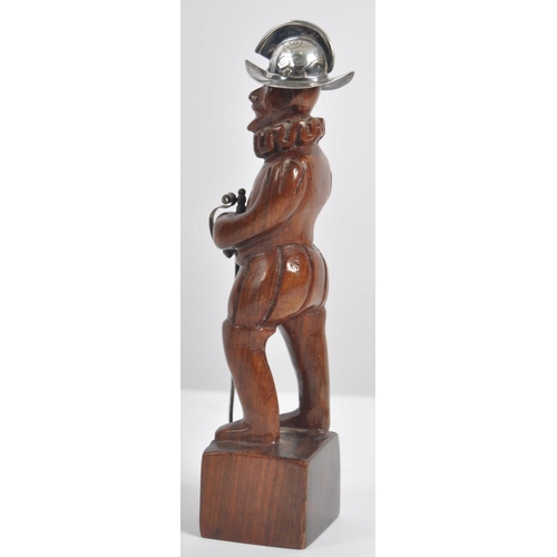 246 - A 20th Century wooden carved Spanish Conquistador. This standing figure carved from one piece of har... 