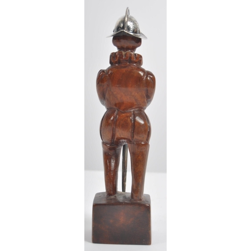 246 - A 20th Century wooden carved Spanish Conquistador. This standing figure carved from one piece of har... 