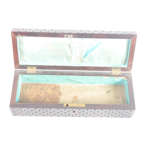 248 - A 19th Century rosewood & cut steel studded glove box. Of rectangular form with a studded steel top ... 