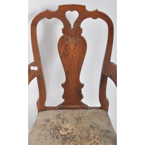 259 - An early 19th Century George III carved walnut carver armchair having a single splatback support wit... 