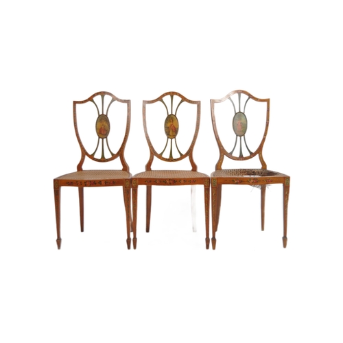 26 - A set of three 19th Century painted faux satinwood shield back dining chairs. Mahogany frames with p... 