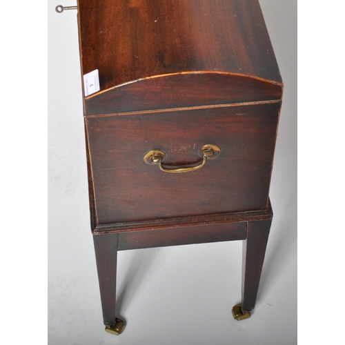 263 - An early 19th Century Regency period mahogany cellarette wine cooler. Domed lid with flame mahogany ... 