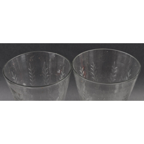 264 - A pair of large mid-Victorian 19th century engraved glass vase, the vase has a bell form bowl raised... 