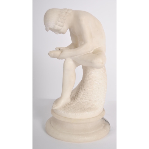 265 - A 19th Century Italian Grand Tour white marble alabaster figurine depicting the boy with thorn in fo... 