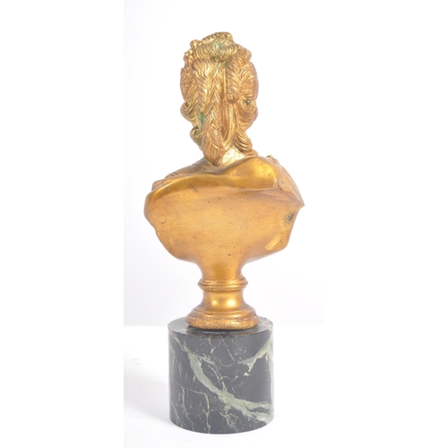 266 - An early 20th century gilded bronze bust sculpture of Marie Antoinette, raised on a cylindrical marb... 